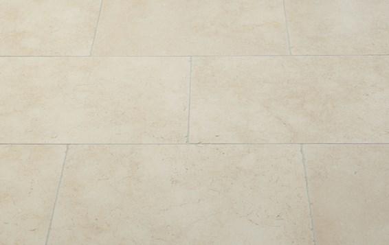 Siena Classic limestone tile detail showing antique limestone character and smooth finish