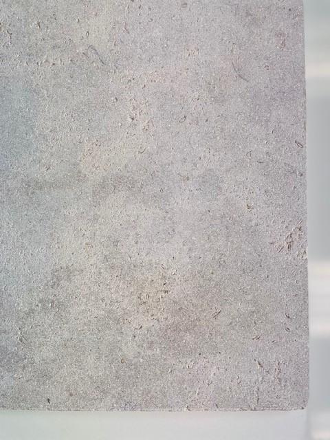 Stratford limestone slab showing pale grey beige colouring with sandblasted surface and tumbled edges